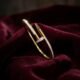 Fancy Crystal Nail Motif Stainless Steel Handcuff Bracelet
