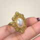 Stainless Steel Adjustable Ornate Oval Pearl Statement Ring